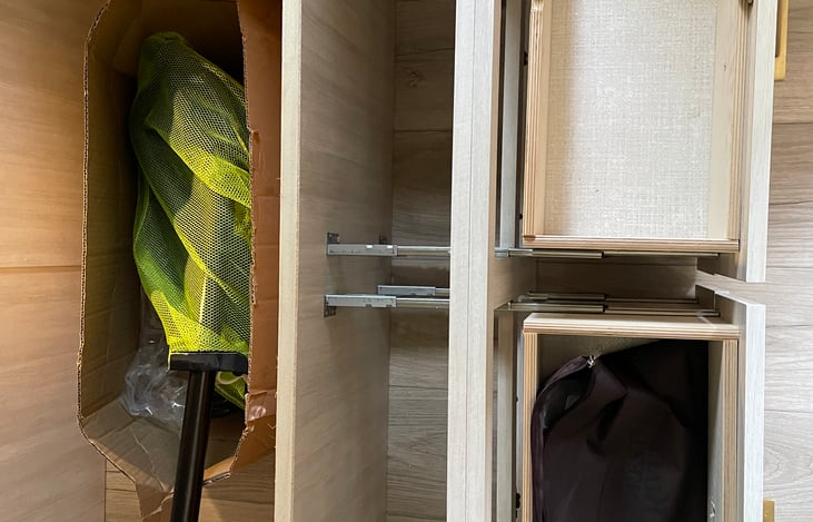 Under queen bed storage. Here is the vacuum hose and additional storage for your use.