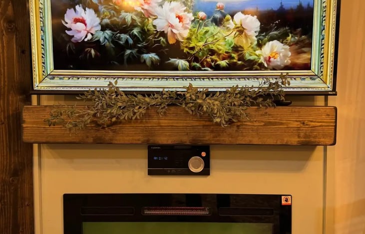 50" TV and fireplace