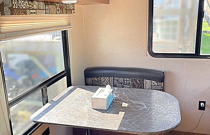 Dining area that turns into 2 sleeping spaces