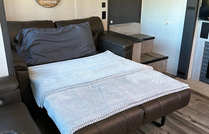 Living room pull out bed (It's pretty comfy for a pull out, no springs or bars)