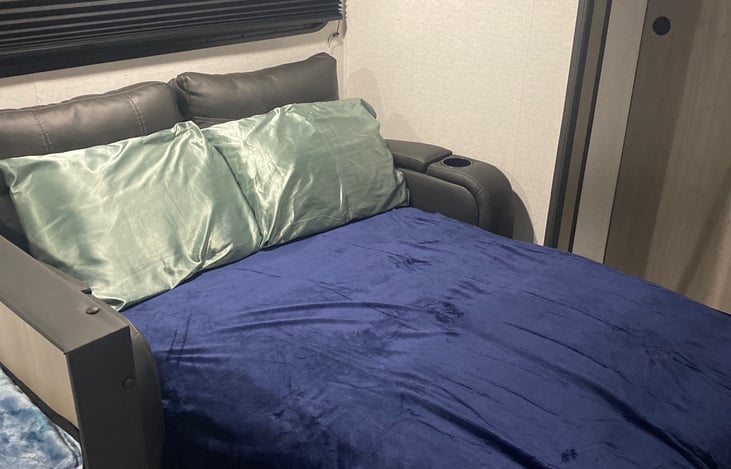 Love seat converted to bed.