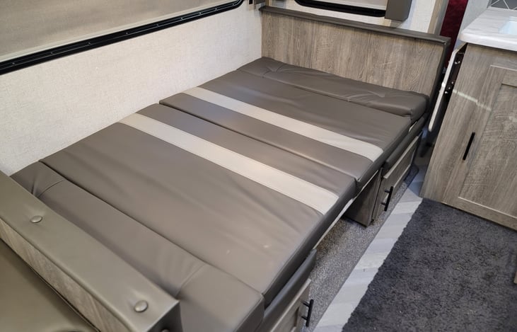 Dinette converts to bed.