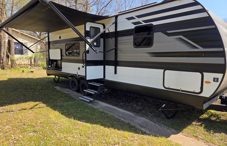 Awning with outdoor speakers