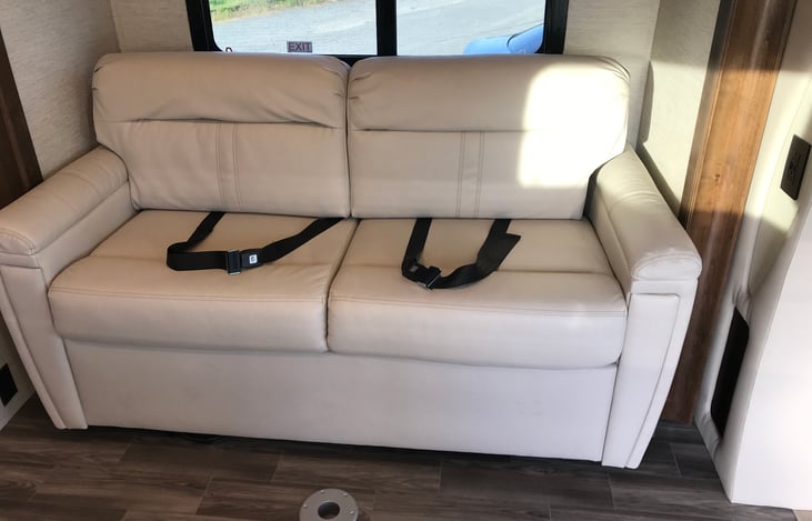 Pull out couch.  Seats two, sleeps 1-2