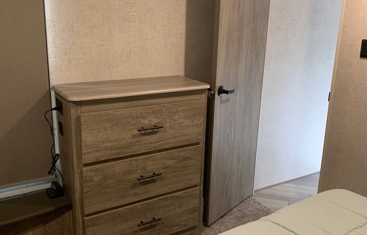 Dresser and entrance to main bedroom.