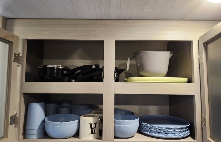 Plates, bowls, cups, coffee cups, cutting board pots, and pans.