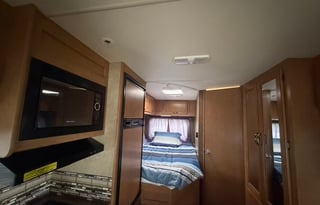 Ready go! Comes with a grill, pillows, cookware...