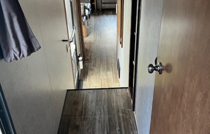 Hallway from master bedroom.  Bathroom door is on the right.