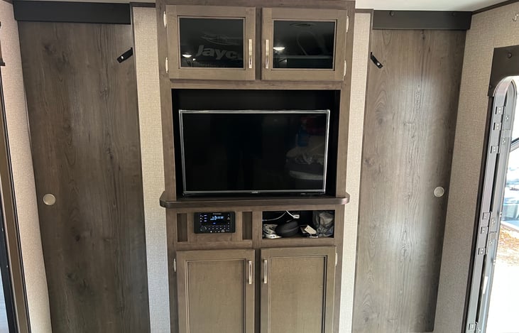 Master bedroom can be closed off from rest of camper.  TV seen here is included.