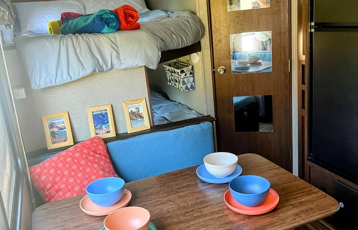 Bedding, towels, and dishware are available for the rental.