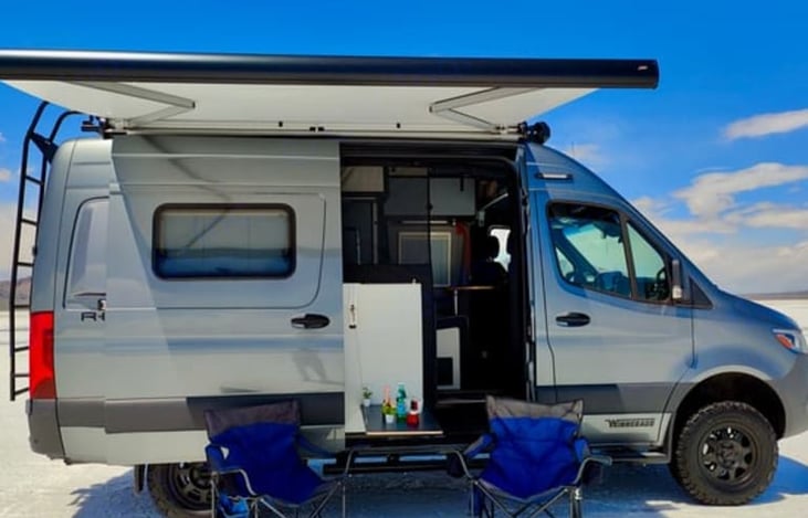 Awning and 2 chairs are complimentary for your journey. The gear garage can hold much more. 2 Mountain Bikes, Stand Up Paddle Boards, a double kayak. All beneath the queen size bed.
