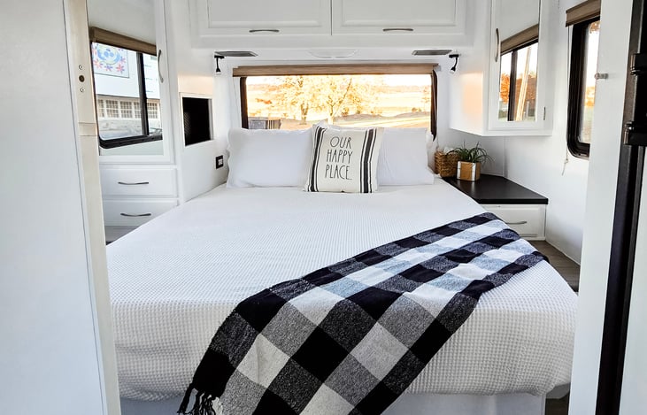 The queen bed has a nice upgraded mattress. 
Closet space on each side of the bed.