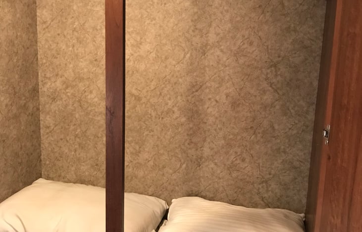 Rear bedroom inside wardrobe closet.