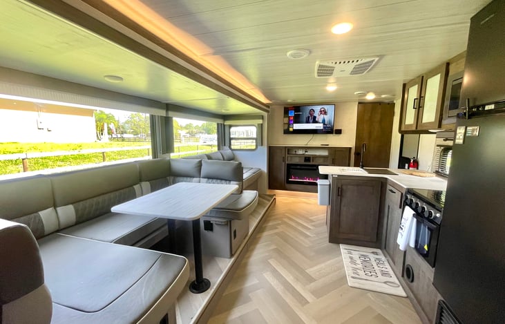 Dining room and living room both convert to sleeping space.