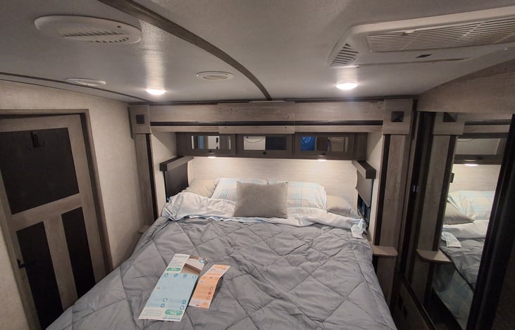 The king size master sweet with bed and pillow case incase in a bedbugs protection case. 2 king size pillows.
