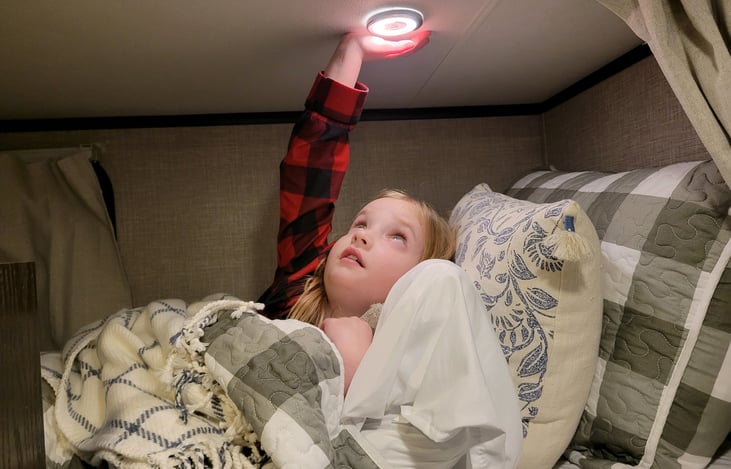 Your little ones will appreciate privacy in their bunks with reading lights and storage.