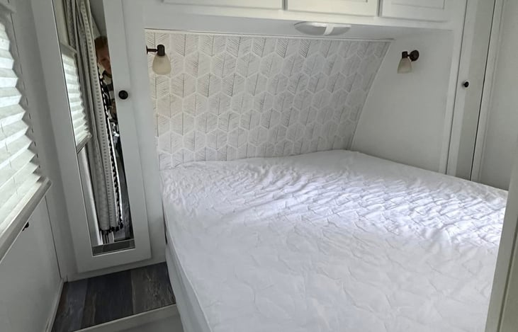 Updated pictures of bedroom after adding wallpaper to the headboard board area 5/2024