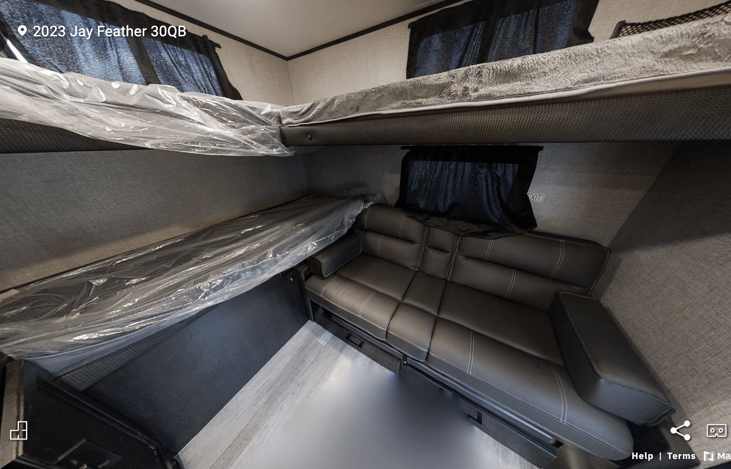 back bunk house with 3 twin beds and a pullout couch