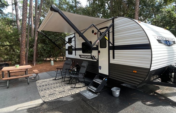 Delivered and set up! We also have a fire pit that you may use if your campground permits it!