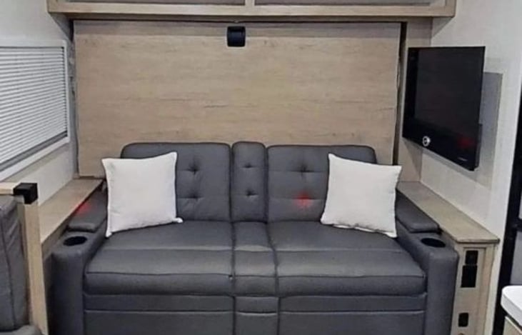 Plush sofa during the day, queen Murphy bed at night
