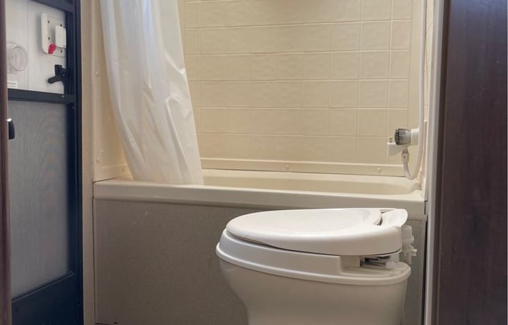 Bathroom with 2nd door and a tub