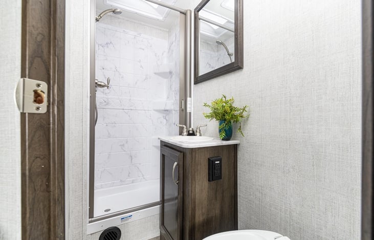 Full Bathroom, Sink and Shower with electric Water Heater.