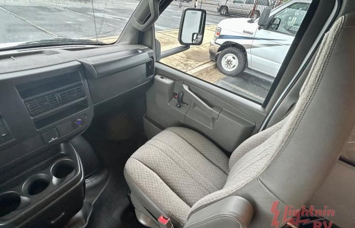 Passenger seat in cab.