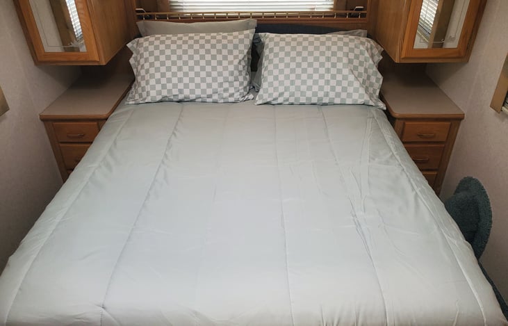 Queen size select number bed with remote controls for each side.