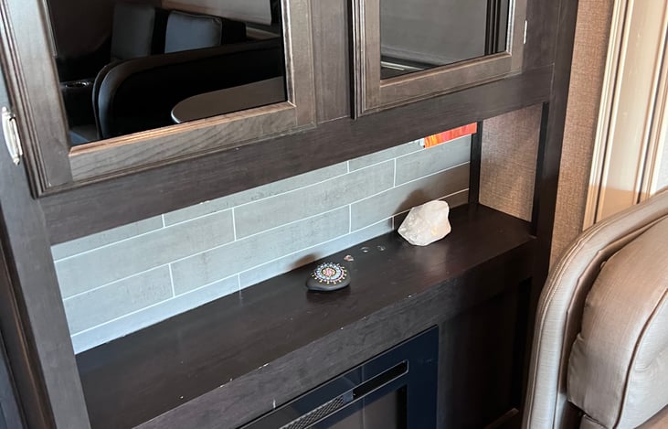 Fire place has remote colors, temperature controls