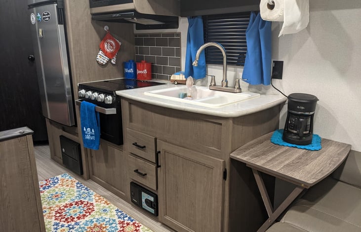 Full functioning Kitchen. Propane stove and oven. Decent sized fridge and freezer. And double sink.