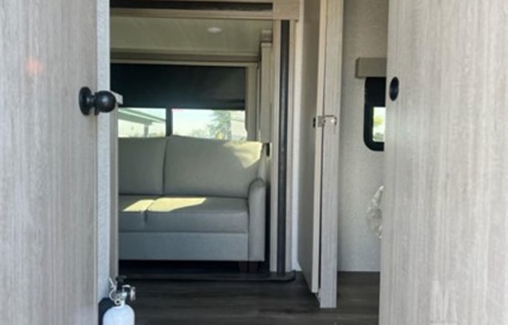 One touch couch that converts into a queen bed