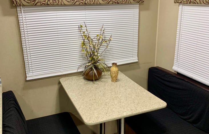 Convertible dinette/bed with bedding stored underneath