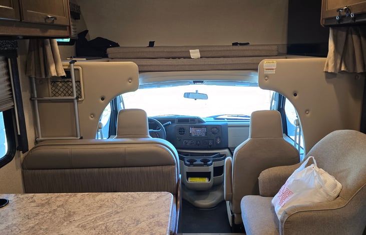 Looking into cab.  Fridge is full, ready to go!!