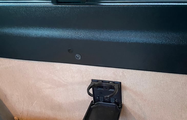 Two cupholders on each side of sofa for traveling guests.