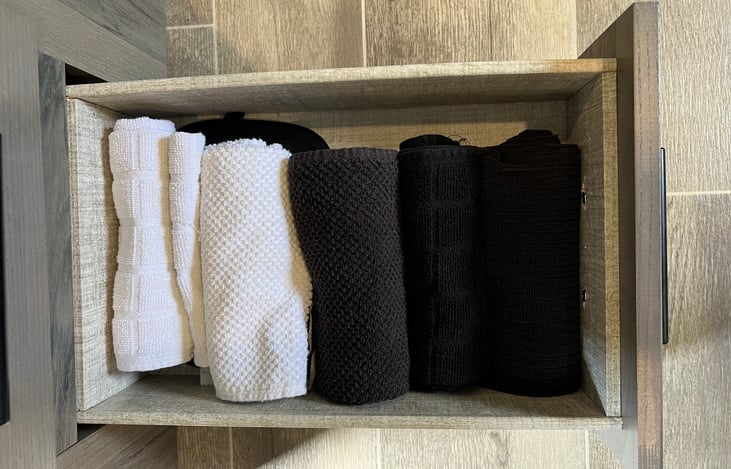 kitchen towels and pot holder drawer