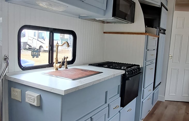 Above sink chopping board.