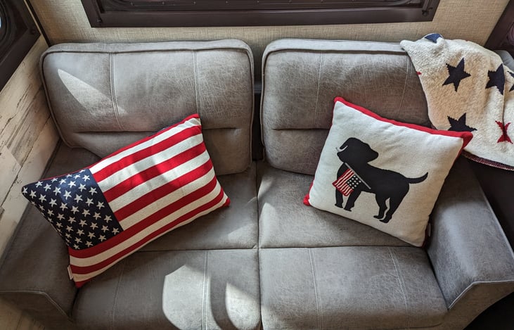 Inside decor pillows and blanket for sofa.