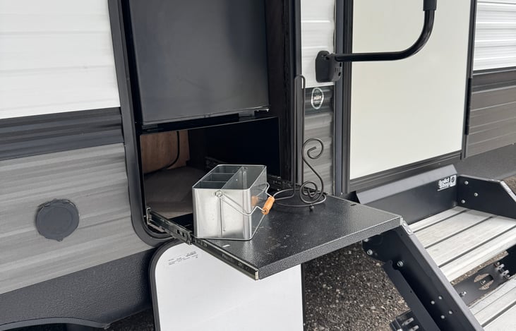 Outer mini fridge and slid out counter