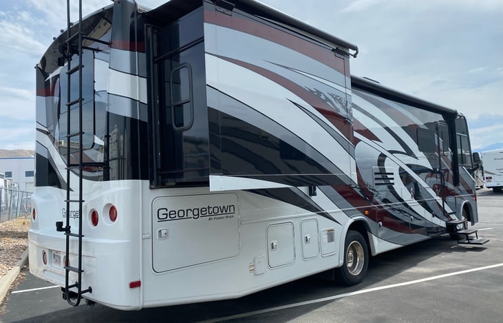View of Motor Home with King bedroom slide extended.
