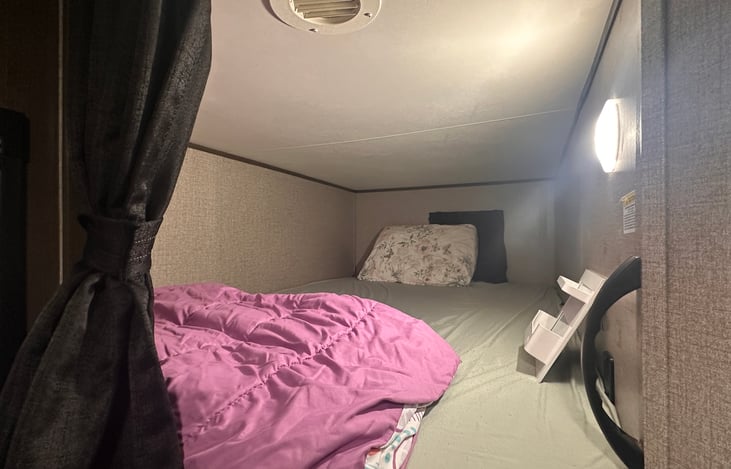 Full size top bunk.