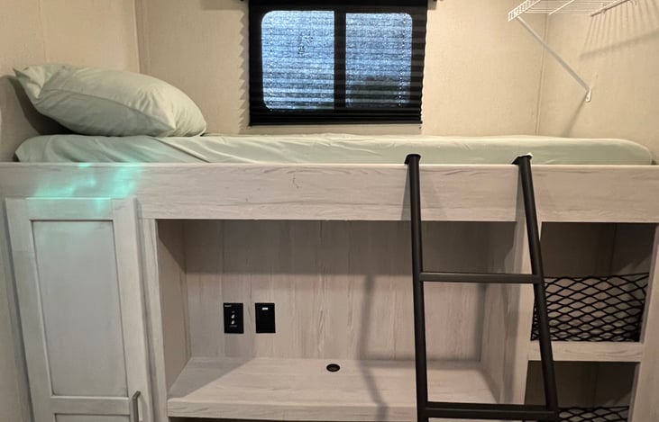 Bunkhouse, other bunk.  Does have wire shelving for extra storage