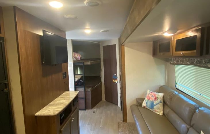 Fold out sofa slide out and entertainment center