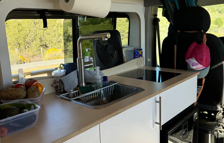 Kitchen with sink and stop top