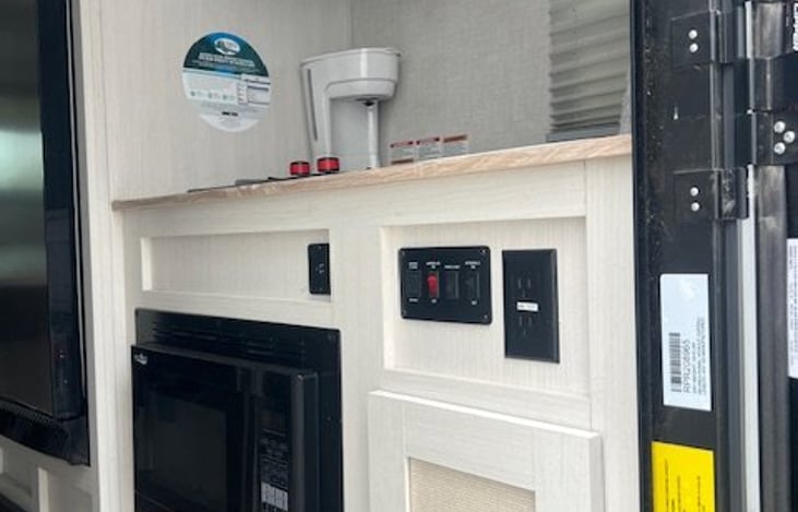 Propane stove/convection oven/coffee maker, and kitchen sink!