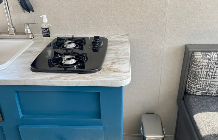 Small trash can and three bags provided.