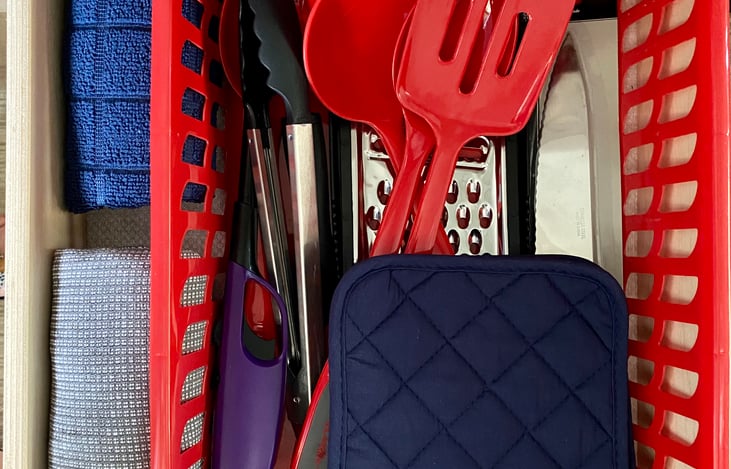 Kitchen utensils, pot holders, dish towel, and wash cloth