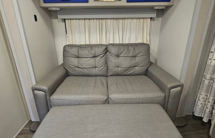 The loveseat extends into a comfy chaise-style lounge