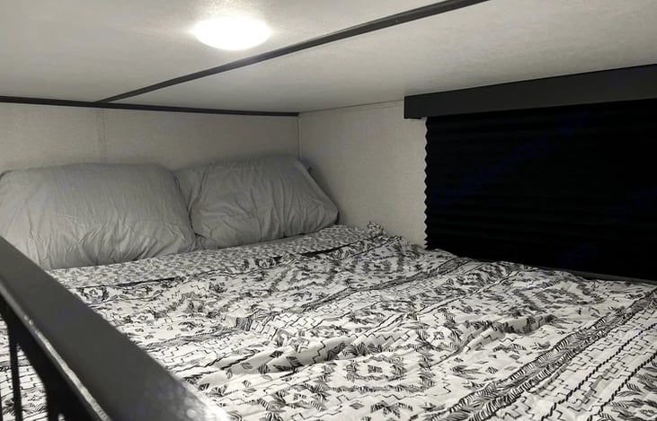 Full size bed in the loft
