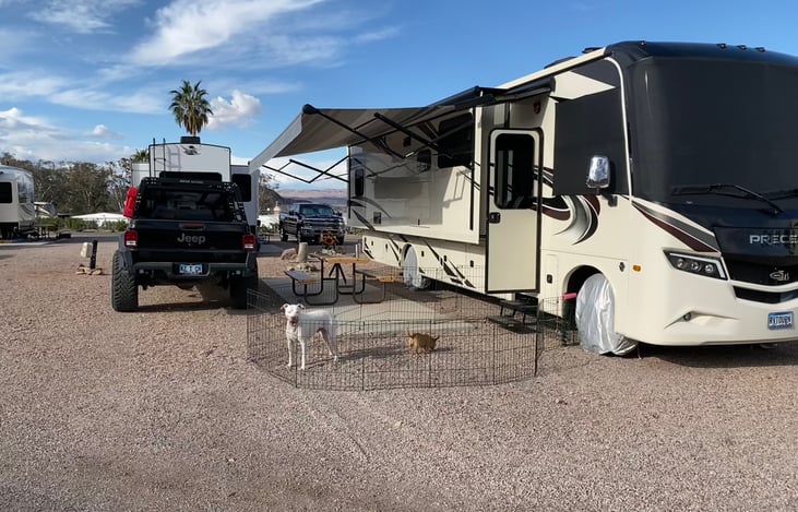 Six months here at Boulder Beach RV Village at the lake. Also has window shades see through to keep heat out.