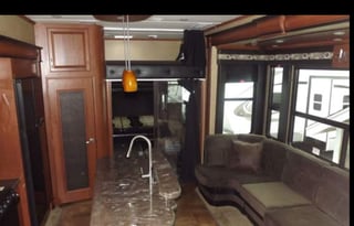 Luxurious Toy-hauler with 3 slides and 14' garage.